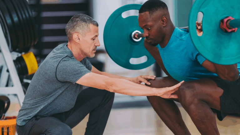trainer helping client follow a better fitness plan