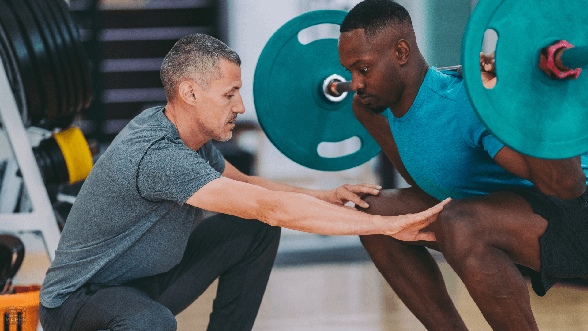trainer helping client follow a better fitness plan